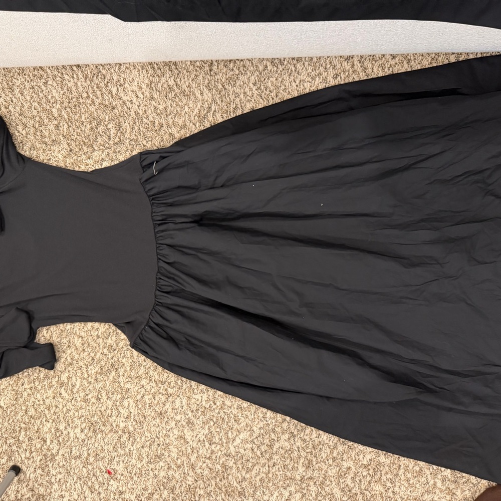 H&M dress with flared skirt. New.
